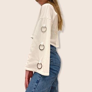 Cropped sweater with sleeve details